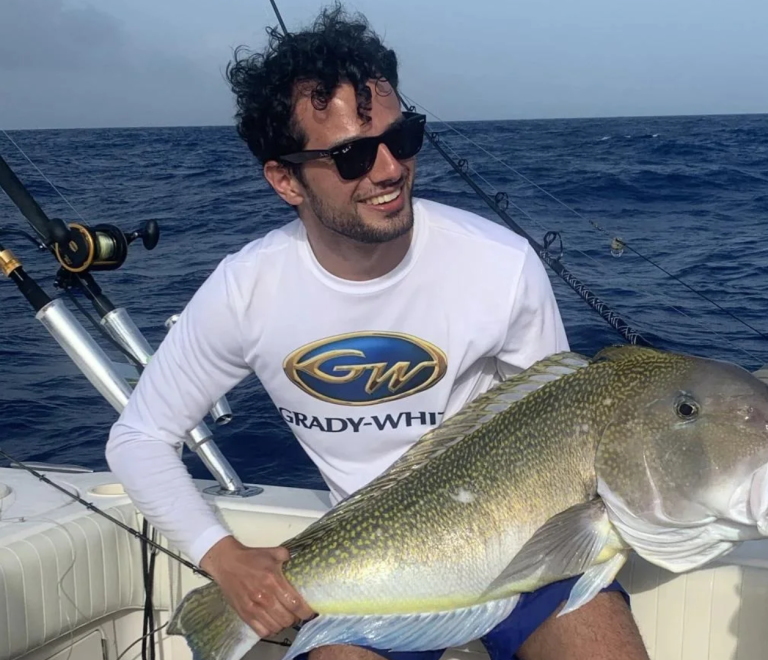 Islamorada fishing trip – happy guest with big grouper on board