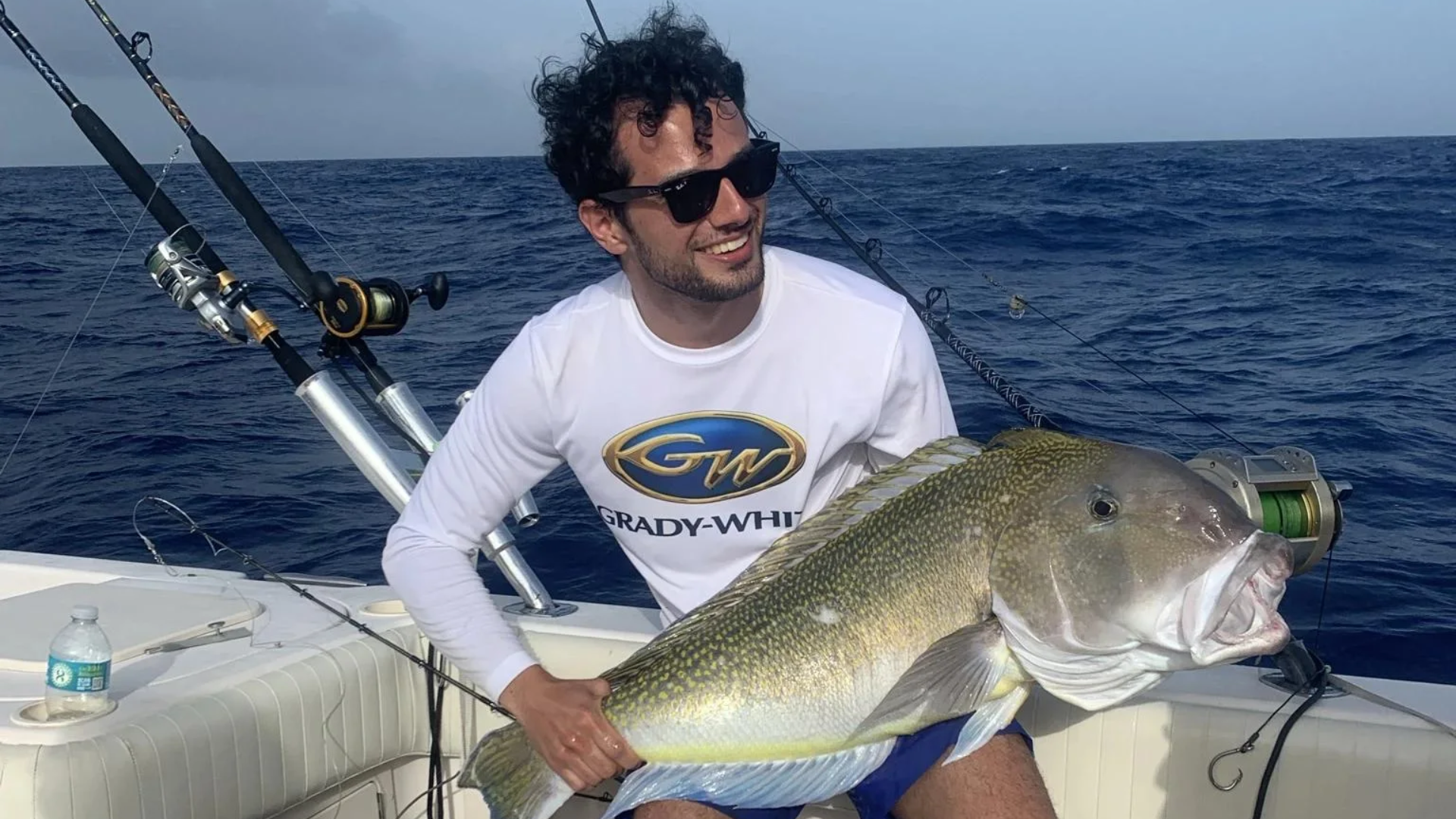 Islamorada fishing trip – happy guest with big grouper on board
